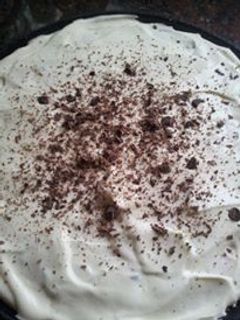Una foto de Tarta de banana, crema y dulce de leche