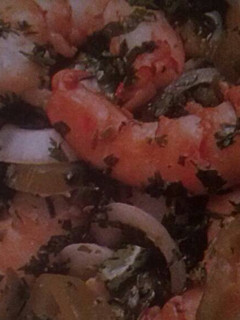 Una foto de Camarones encilantrados