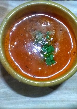 A picture of Pure vegetarian tomato carrot soup.
