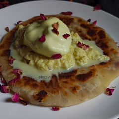 A picture of Gulab Jamun Paratha.