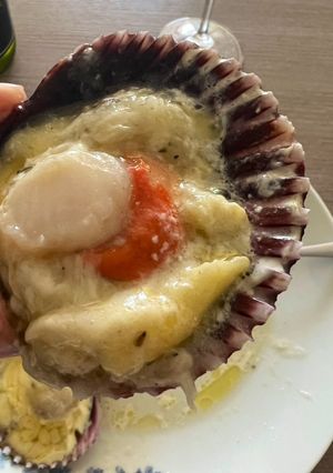 Una foto de Ostiones a la parmesana