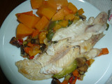 Merluza con verduras en el horno