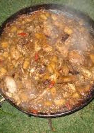 Una foto de Arroz con pollo al disco