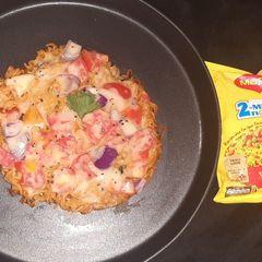 A picture of Left over roti maggi mayo pizza.
