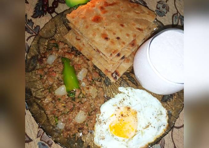 Qeema Do pyaza with crispy Paratha and Strawberry Lassi