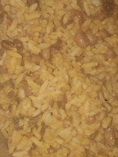 A picture of Jollof rice and beans.