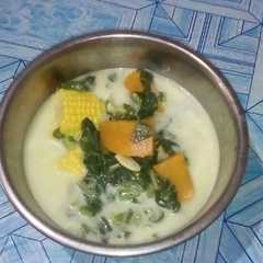 A picture of Sayur santen,jagung, labu, sawi,,.