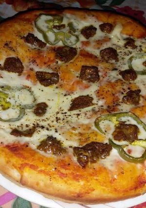 A picture of Beef tikka pizza.
