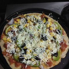 A picture of Wheat pizza at home.