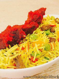A picture of Stirred fried rice and fried peppered beef.