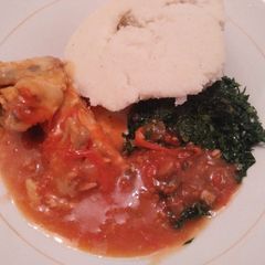 A picture of Stewed chicken with James and ugali.
