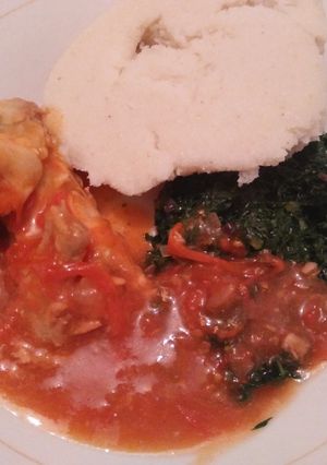 A picture of Stewed chicken with James and ugali.