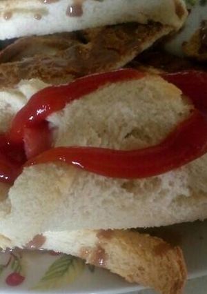 Una foto de Rollitos de pan con salchicha y queso,