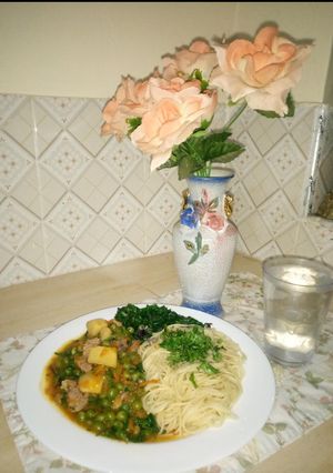 A picture of Spaghetti 🍝 with Beef vegetable stew and Steamed Spinach.