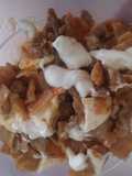 Chilaquiles rojos con panela y res