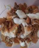 Chilaquiles rojos con panela y res