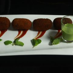 A picture of Cheesy rice pakora.