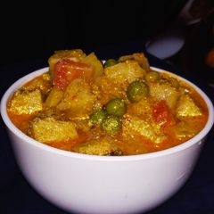 A picture of Banana Curry With Coconut & Poppy seed gravy.