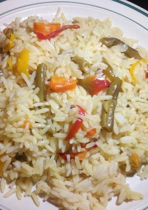 A picture of Rice with vegetables.