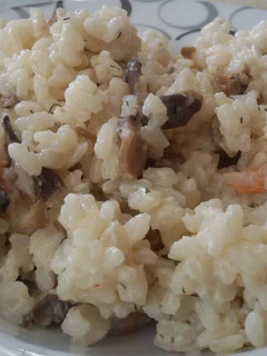 Una foto de Arroz cremoso con setas y gambas