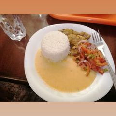 A picture of Butternut soup and roasted chicken.
