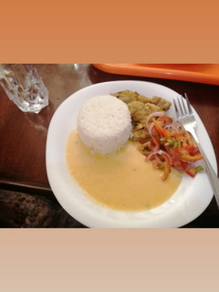 A picture of Butternut soup and roasted chicken.