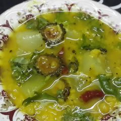 A picture of Titar dal (moong dal made with lauki and karela).