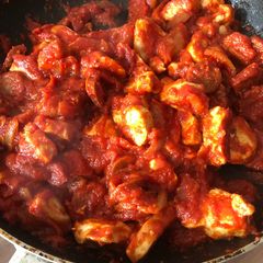 A picture of Chicken and chorizo.