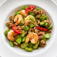 A picture of Stir-Fried Sator Beans with Shrimp Paste, Minced Pork, and Fresh Shrimp.