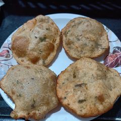A picture of Sooji Aloo Puri.