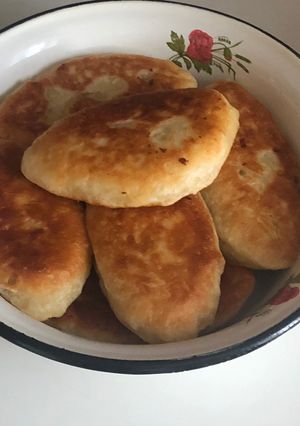 Фото Жареные пирожки с картошкой и капустой.