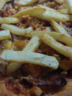 Una foto de Pizza bbq bacon y queso