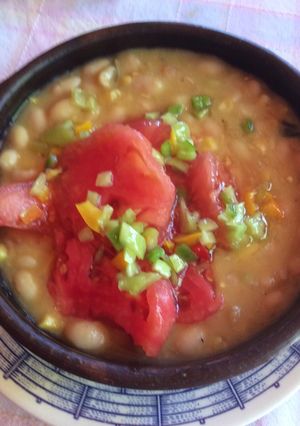Una foto de Porotos granados con pirco y mazamorra