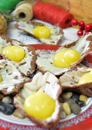 Una foto de Ostras de chocolate con crema de mandarina
