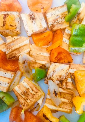 A picture of Grilled tofu with veggies.