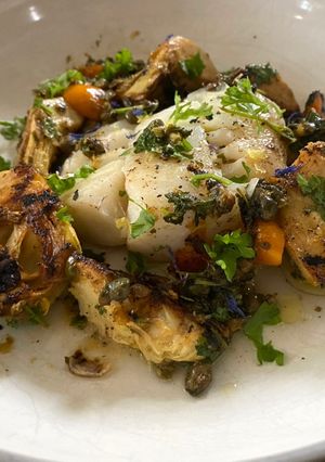 A picture of Pan-Fried Cod and Artichoke in a Caper Calamondin Butter Sauce.