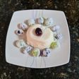 57. Flan de queso con uvas