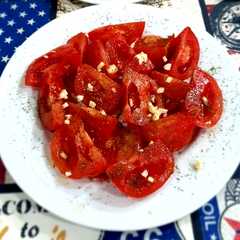Una foto de Tomate al ají 🍅🧄
