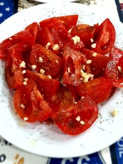 Una foto de Tomate al ají 🍅🧄