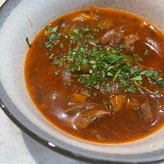 A picture of Lamb shank Italian-style stew.