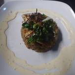 Crab Cake Caramelized onions Sauted Swiss Chard and Dill Cream