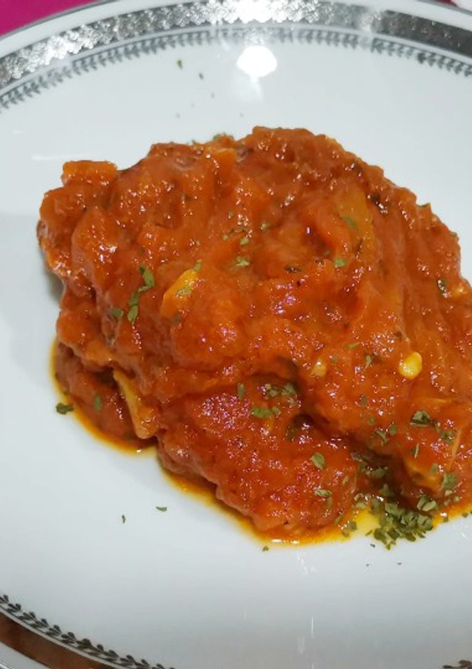 Una foto de Bacalao con tomate