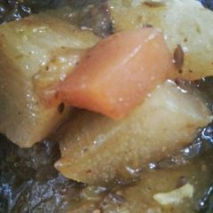 A picture of Khatta meetha Kaddu with cocktail fruit.