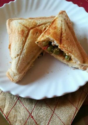 A picture of Sandwich with leftover peas filling.