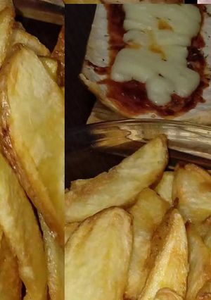 Foto principal de Papas rústicas con pizza casera