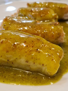 Una foto de Rollitos de pollo y Philadelphia al pesto de pistachos