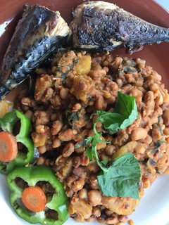 A picture of Beans and plantain porridge with sent leaf.
