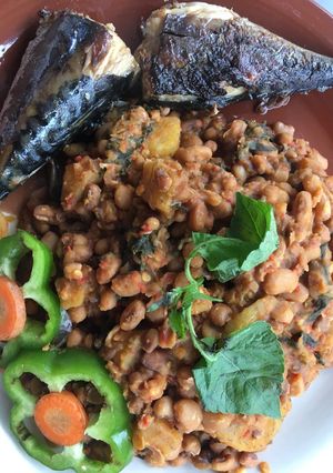 A picture of Beans and plantain porridge with sent leaf.