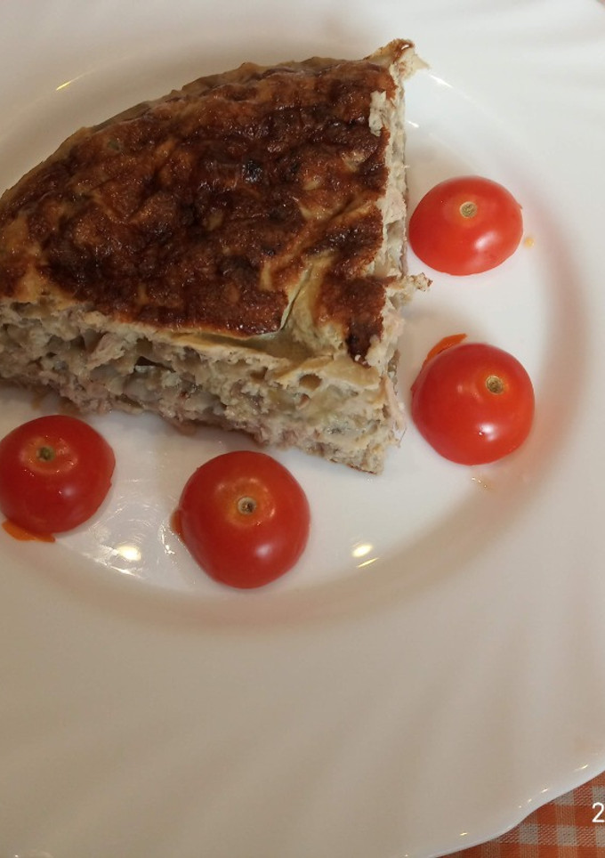 Una foto de Tortilla de berenjena, cebolla y atún