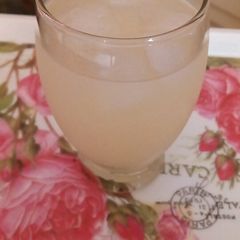 A picture of Grape and lemon juice on the rocks!.